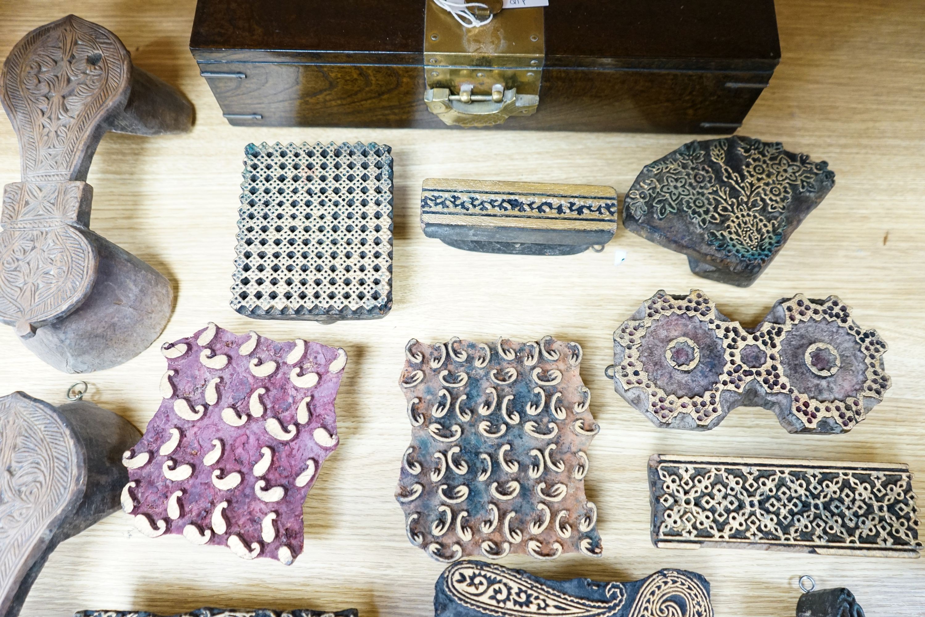 A mixed group of Indian fabric printing blocks and a Chinese wood box, 40.5cm